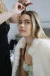 Hairstylist Styling Hair for Model