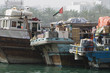 dubai uae dhows old wooden sailing vessels are docked along the deira side of dubai creek.