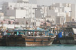 Photo: dubai uae dhows old wooden sailing vessels are docked along the deira side of dubai creek. dubai uae dhows old wooden sailing vessels are docked along the deira side of dubai creek.