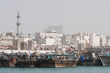 Photo: dubai uae dhows old wooden sailing vessels are docked along the deira side of dubai creek. dubai uae dhows old wooden sailing vessels are docked along the deira side of dubai creek.