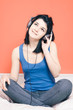 Woman listening music on headphones