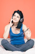 Woman listening music on headphones