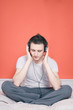 Man listening to music with his eyes closed