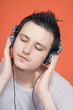 Man listening to music with his eyes closed