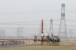 Photo: dubai uae camels and jockeys training at nad al sheba camel racetrack at sunset dubai uae camels and jockeys training at nad al sheba camel racetrack at sunset