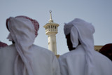 Photo: UAE, Dubai, group of traditionally dressed Muslim men perform a song for visitors to the Bastakia UAE, Dubai, group of traditionally dressed Muslim men perform a song for visitors to the Bastakia