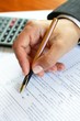 Photo en ligne au meilleur prix Filling a tax form