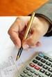 Photo en ligne au meilleur prix Woman in a suit filling a tax form