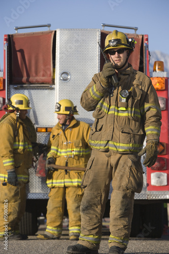 Firefighter using walkie talkie by fire engine  moodboard #15080826 ...