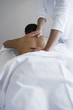 Woman having back massage