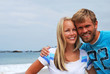 Picture of a cute young couple at the beach in california.