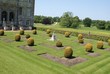 topiary and statue in garden