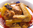 Traditional spicy curry chicken close up