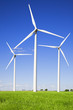 Windmills against blue sky Windmills against blue sky