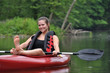 Foto: Woman relaxes on Kayak Woman relaxes on Kayak