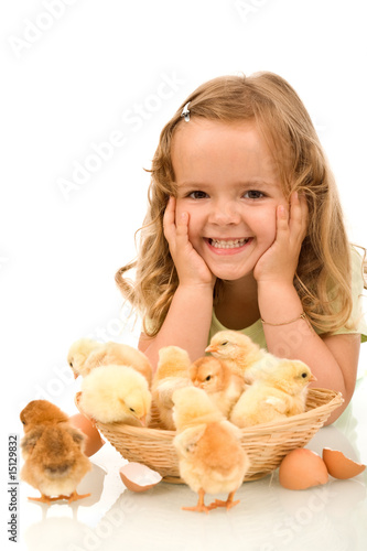 Photo: Happy girl with her little chickens Happy girl with her little chickens