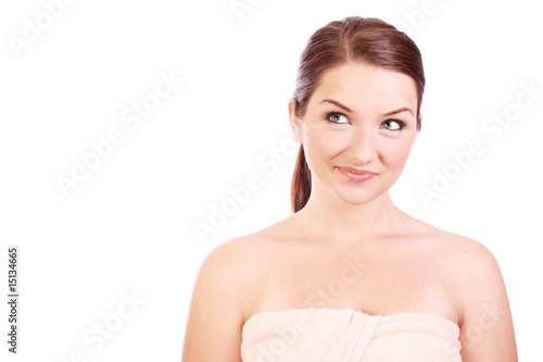 Photo: Smiling woman wearing bath towel Smiling woman wearing bath towel