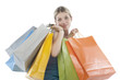 attractive young woman holding several shoppingbags