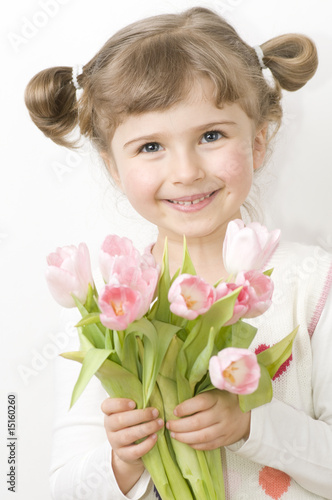 Foto: Cute girl with tulips Cute girl with tulips