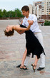young couple dancing Latino dance