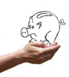 cochon tirelire dans mains