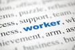 mot worker ouvrier lettres bleu texte flou