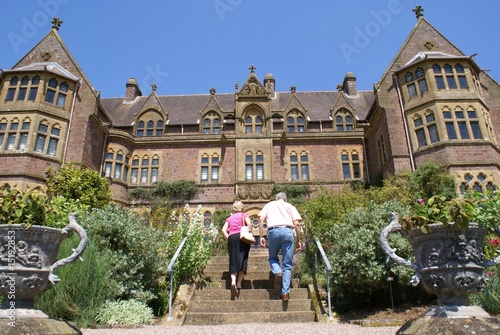 Photo: couple/ visitors walking up steps couple/ visitors walking up steps