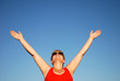 Mature woman looking up to the sky