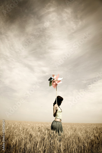 Photo: girl at field in retro style girl at field in retro style