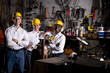 Multi-ethnic coworkers in office maintenance area