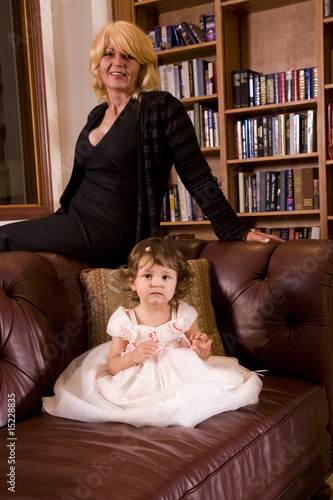 Photo: Portrait of Bosnian grandmother and granddaughter at home Portrait of Bosnian grandmother and granddaughter at home