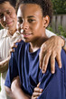 Teenage boy with proud father