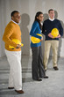 Multi-ethnic people in office space ready for buildout