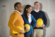 Multi-ethnic people in office space ready for buildout