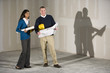Multi-ethnic people in office space ready for buildout