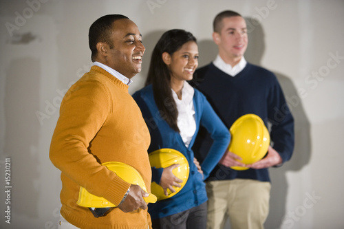 Photo: Multi-ethnic people in office space ready for buildout Multi-ethnic people in office space ready for buildout