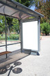 Black banner on a bus shelter.