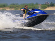 Photo: Jumping man on jet ski Jumping man on jet ski