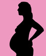 silhouette de femme enceinte sur fond rose silhouette de femme enceinte sur fond rose