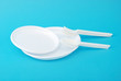 White disposable dishes, fork and spoon