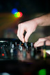 Close-up of deejays hand