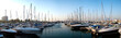 series of panoramic images from the harbor with yachts at dusk