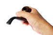 Pipe tobacco in his hand on a white background. (isolated) Pipe tobacco in his hand on a white background. (isolated)