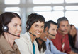 Businesspeople in meeting with translation