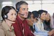 Businesspeople in meeting with translation