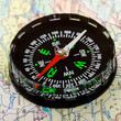 Compass over map background
