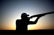 Shooting with a gun silhouette