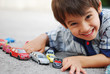 Kid playing with cars toys Kid playing with cars toys
