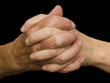 Yound and old hand folded in harmony Yound and old hand folded in harmony