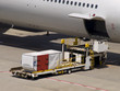 Loading and unloading cargo onto an airplane Loading and unloading cargo onto an airplane